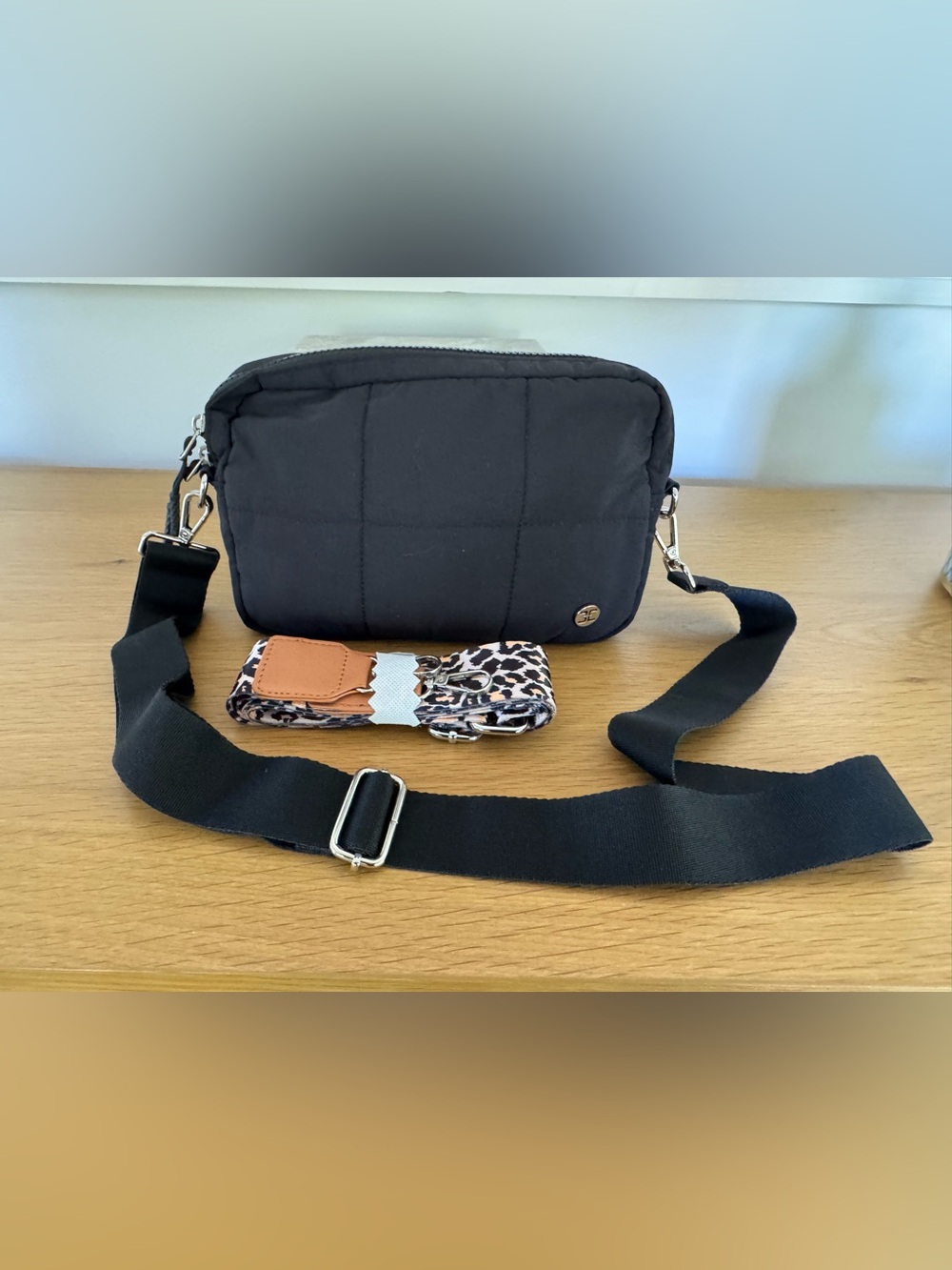 Telena Compact Black Quilted Crossbody Bag with new Leopard Accent Strap